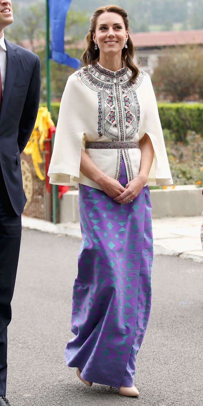 แคเธอรีน Duchess of Cambridge walks with Prince William, Duke of Cambridge as part of a ceremonial Chipdrel on arrival into the Tashichhodzong (fortress) on the first day of a two day visit to Bhutan on the 14th April 2016 in Paro, Bhutan. The Royal cou