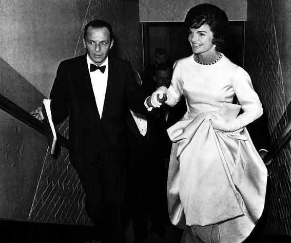 แจ๊คกี้ Onassis, Frank Sinatra escorting Jacqueline Kennedy to her box at a gala