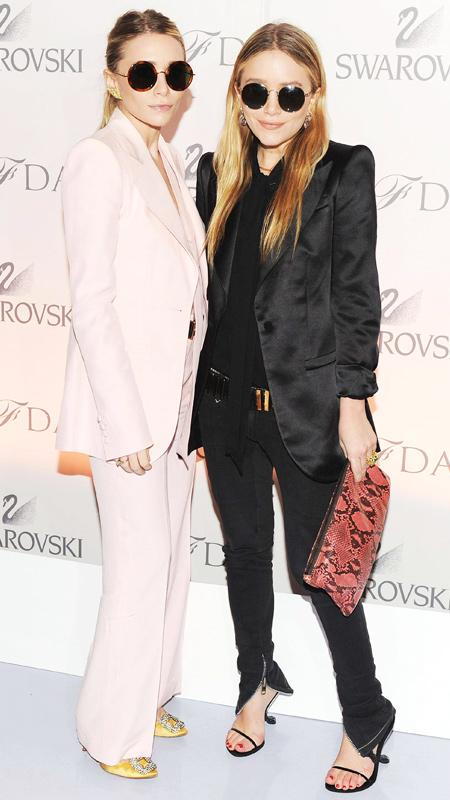 แอชลีย์ Olsen, Mary-Kate Olsen wearing pink suit and black outfit and sunglasses