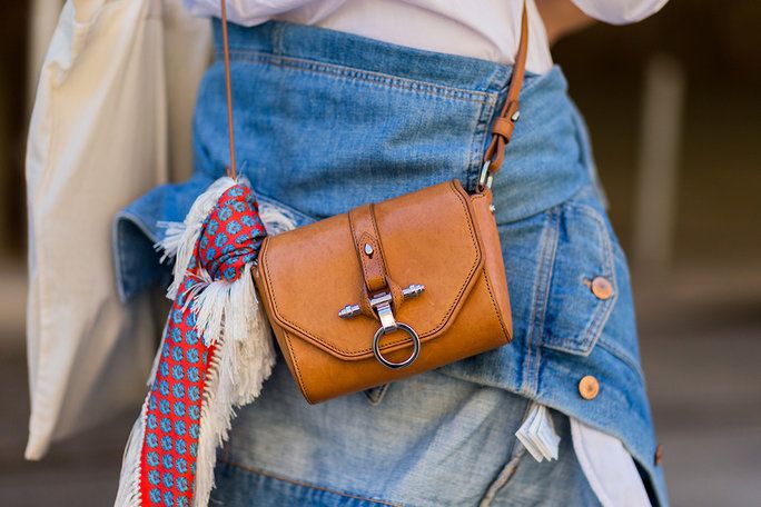 ए fringe-y, boho-inspired scarf plays well with a mini leather crossbody. 