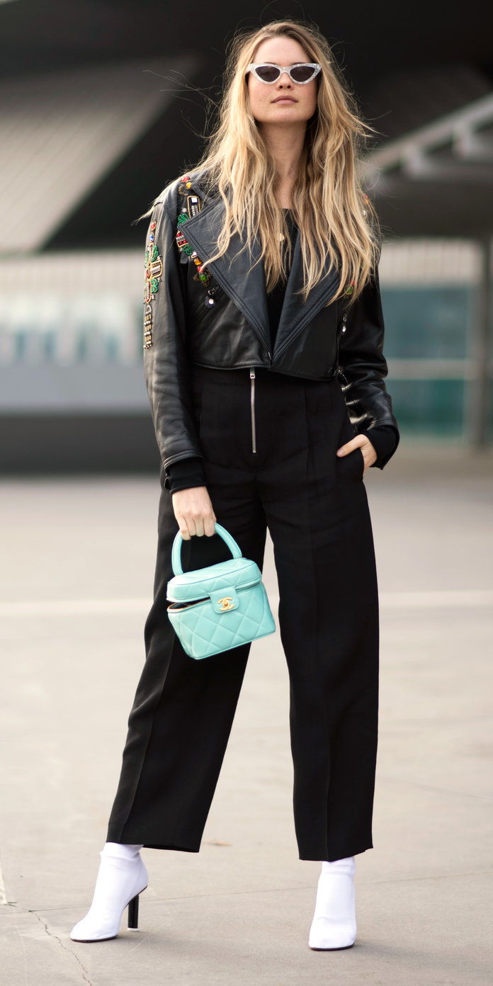 Behati Prinsloo with a pop-of-color bag 