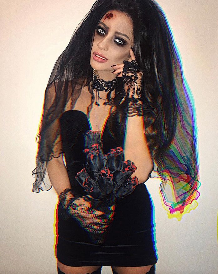 Shay Mitchell as a zombie bride