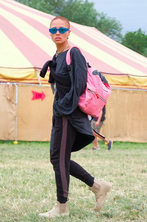 Adowa Aboah going matchy matchy with her Hunter Orignal boots and backpack at Glastonbury 2017 